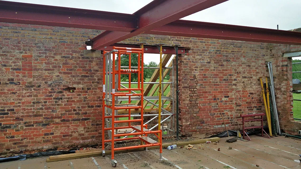 Installation of structural steel beams.